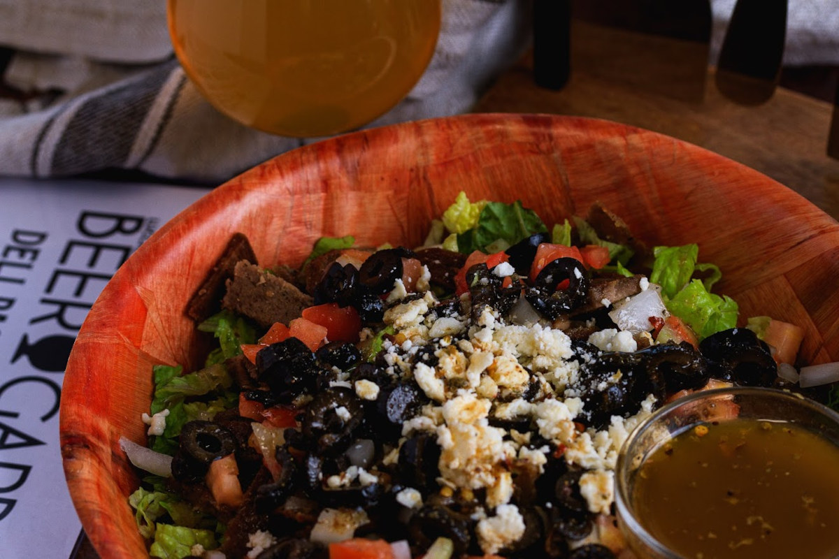 Gyro meat, lettuce, tomato, black olives